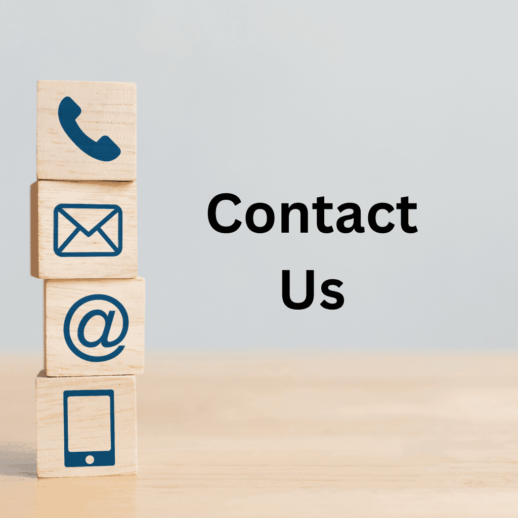 Four stacked wooden blocks with blue communication icons (phone, envelope, @ symbol, smartphone) beside bold black text reading “Contact Us” on a light wooden surface.